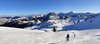 Salita al monte Corona, sullo sfondo le Alpi Giulie