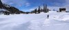 Il lago di Federa ricoperto dalla neve e il rifugio Croda da Lago